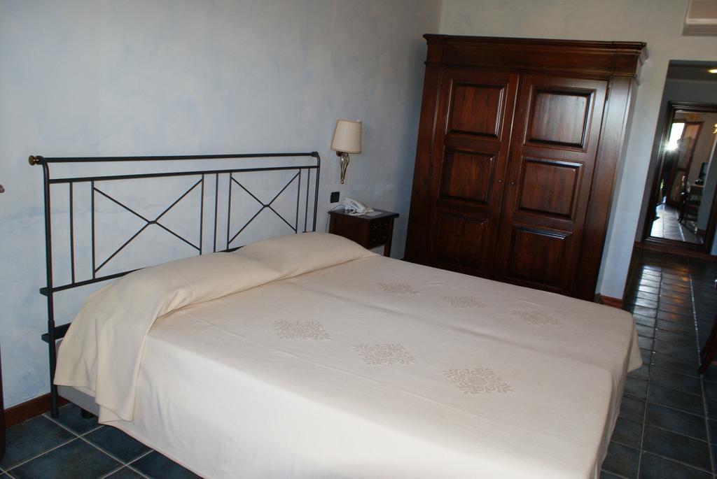 Hotel I Corbezzoli Porto Ottiolu Chambre photo